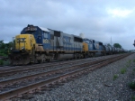 Q 273 waits to head north at the home signal at CP-5 under darkening skies
